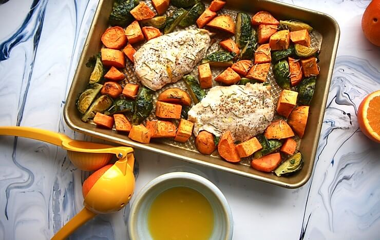 Chicken and vegetables overhead on a sheet pan