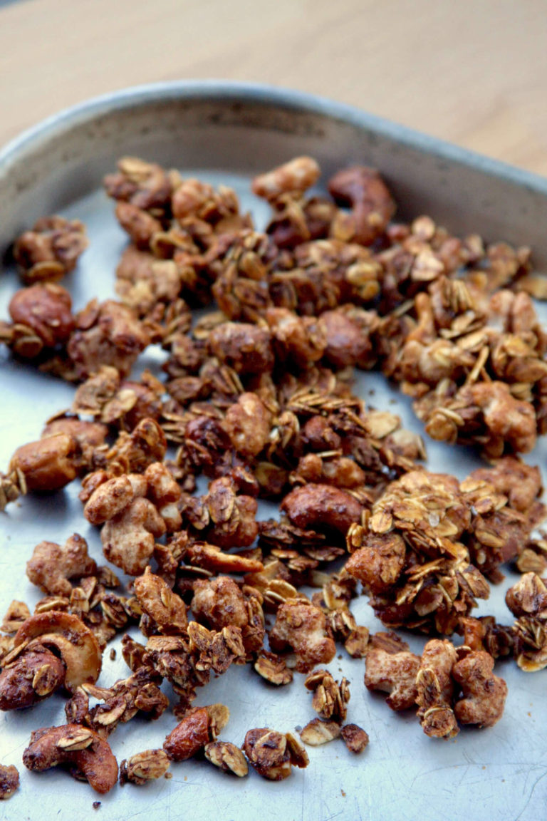 Up close of granola on a sheet pan