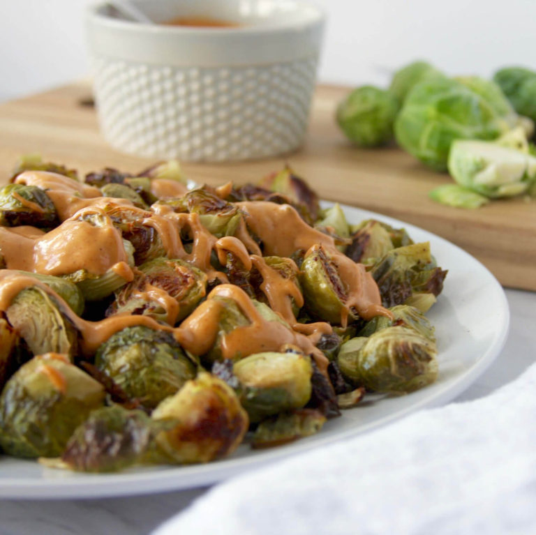 Roasted brussel sprouts topped with chipotle mayo.