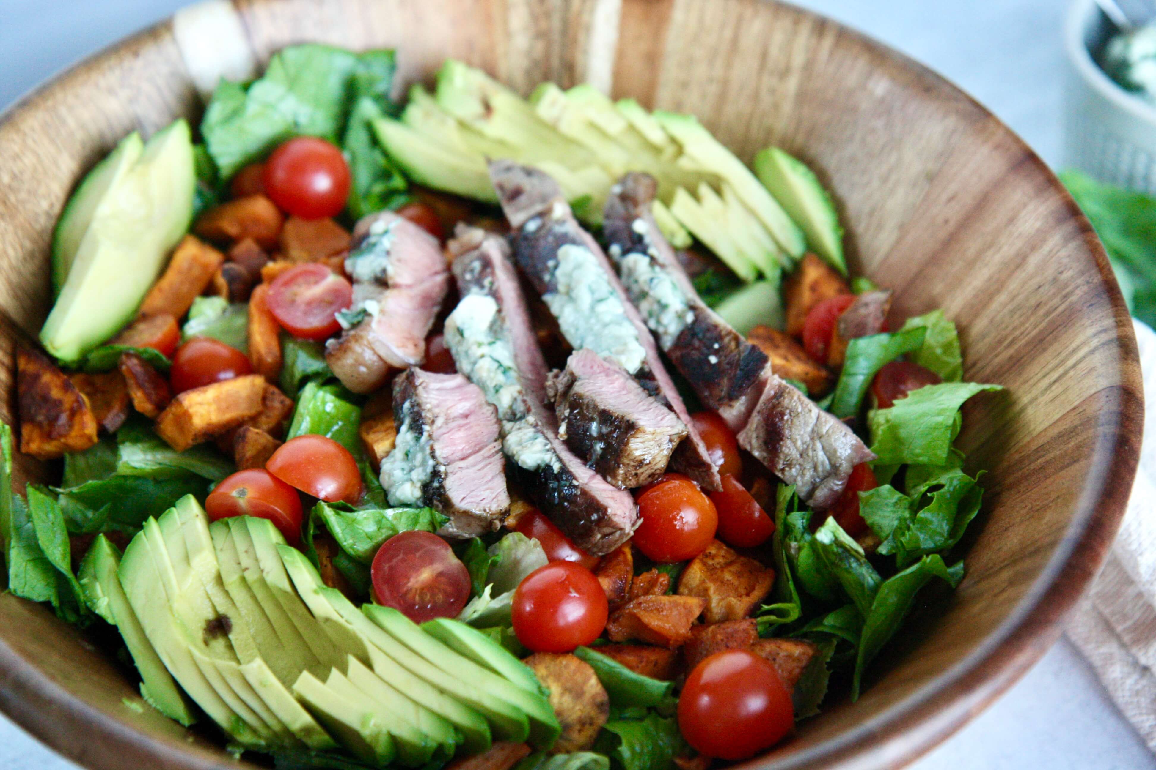 Steak, Sweet Potato, and Avocado Salad with Blue Cheese Butter